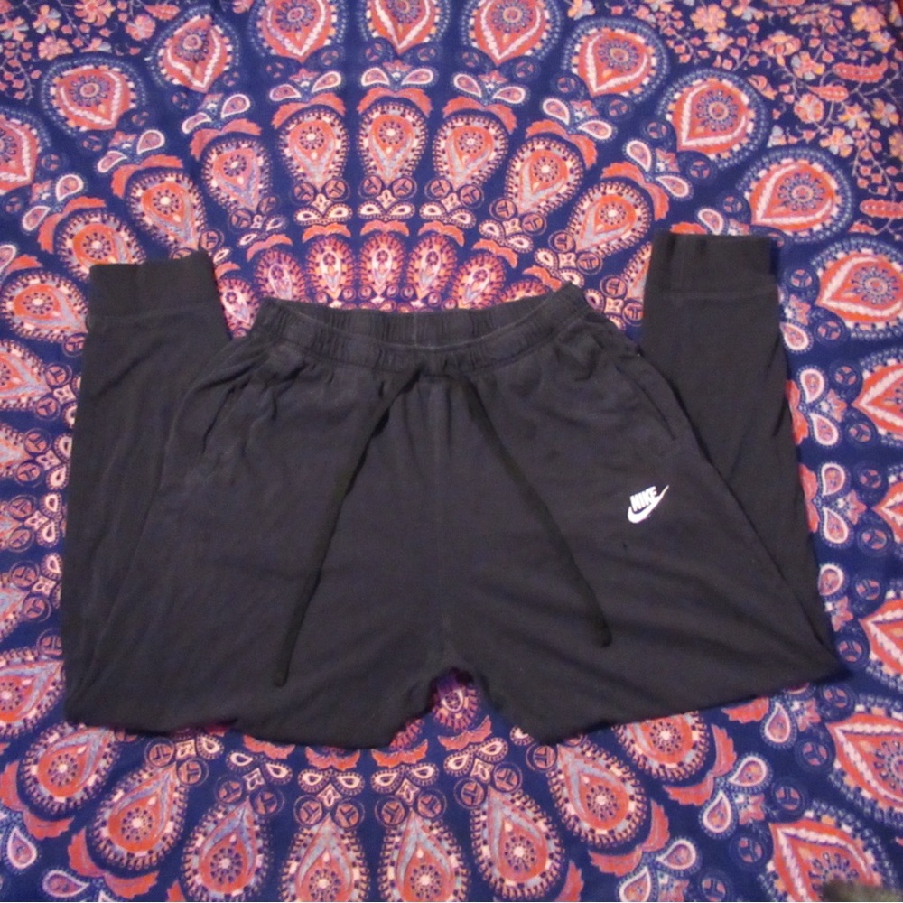 Nike Black Sweatpants with Tapered Legs and Elastic Waistband
